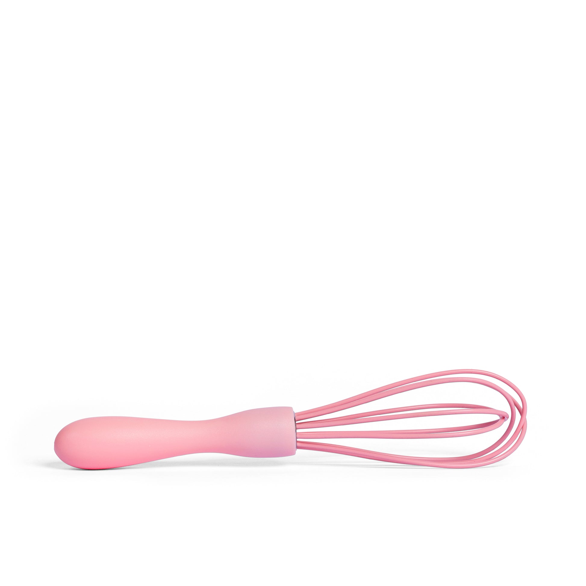 Pink silicone whisk for mixing cake batter whipping cream blending ingredients and preparing homemade desserts