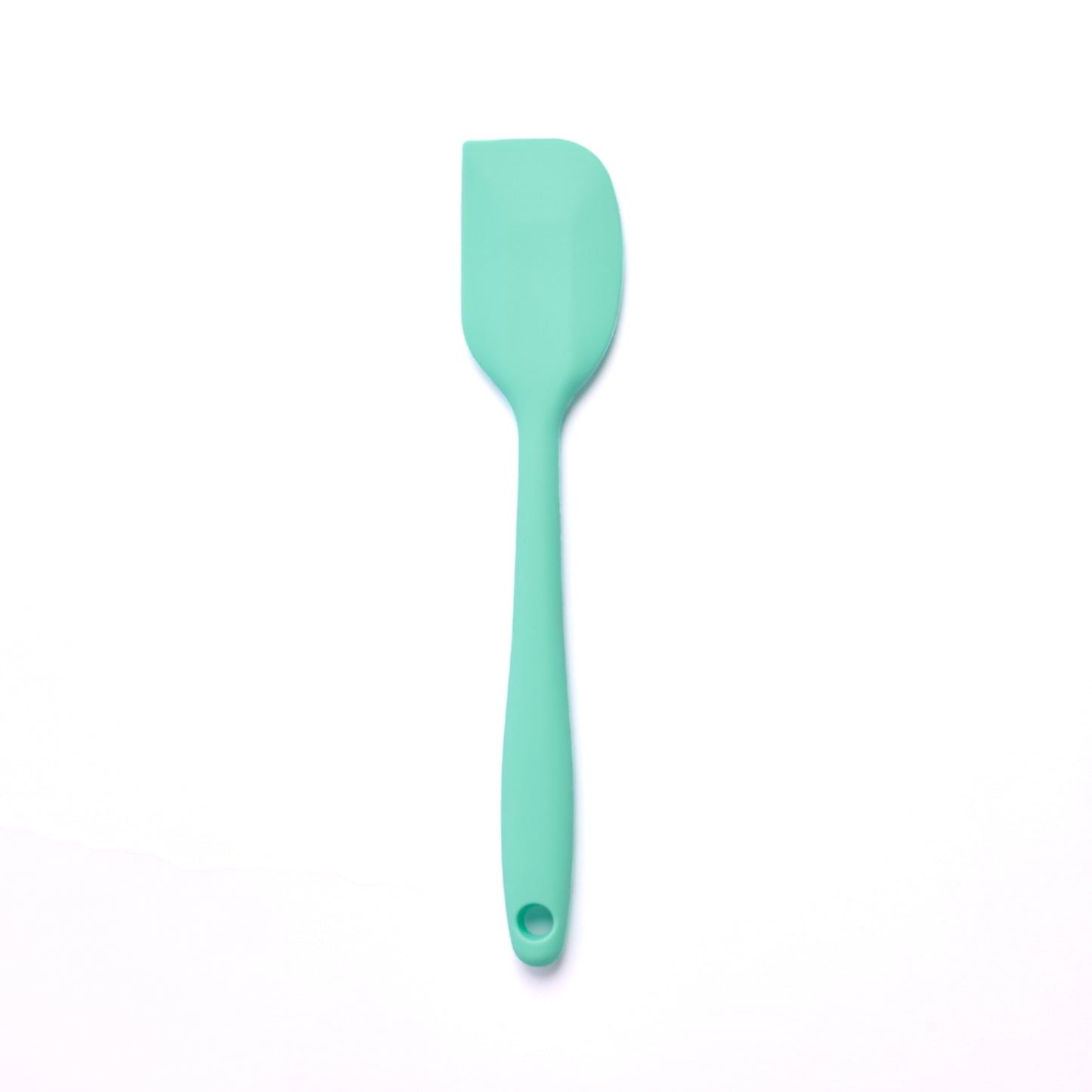 Mint green silicone spatula for baking and cooking ideal for mixing cake batter folding ingredients scraping bowls and making cookies brownies and desserts
