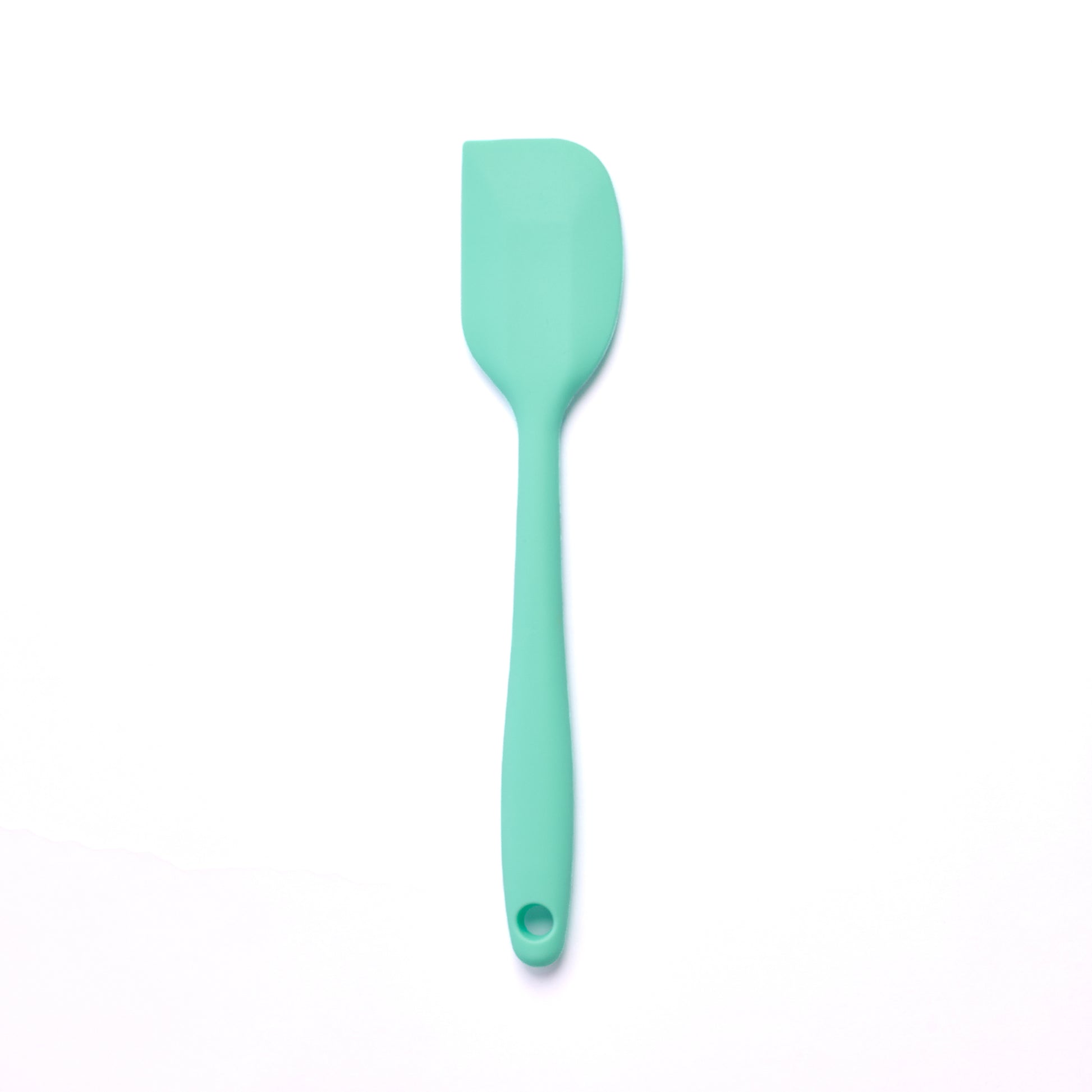 Mint green silicone spatula for baking and cooking ideal for mixing cake batter folding ingredients scraping bowls and making cookies brownies and desserts