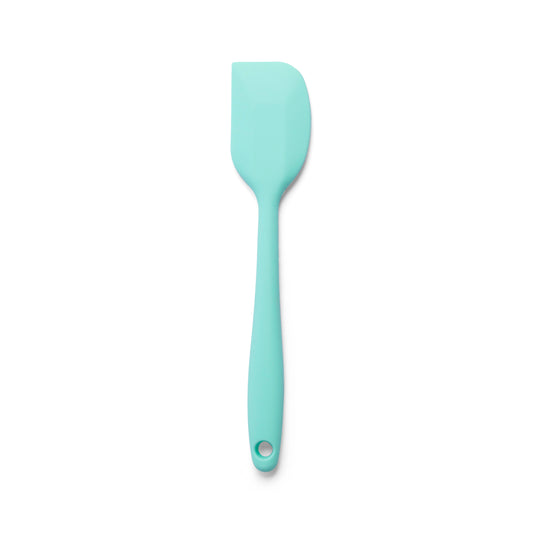 Mint green silicone spatula for mixing cake batter scraping bowls folding ingredients spreading frosting and preparing homemade dessert recipes
