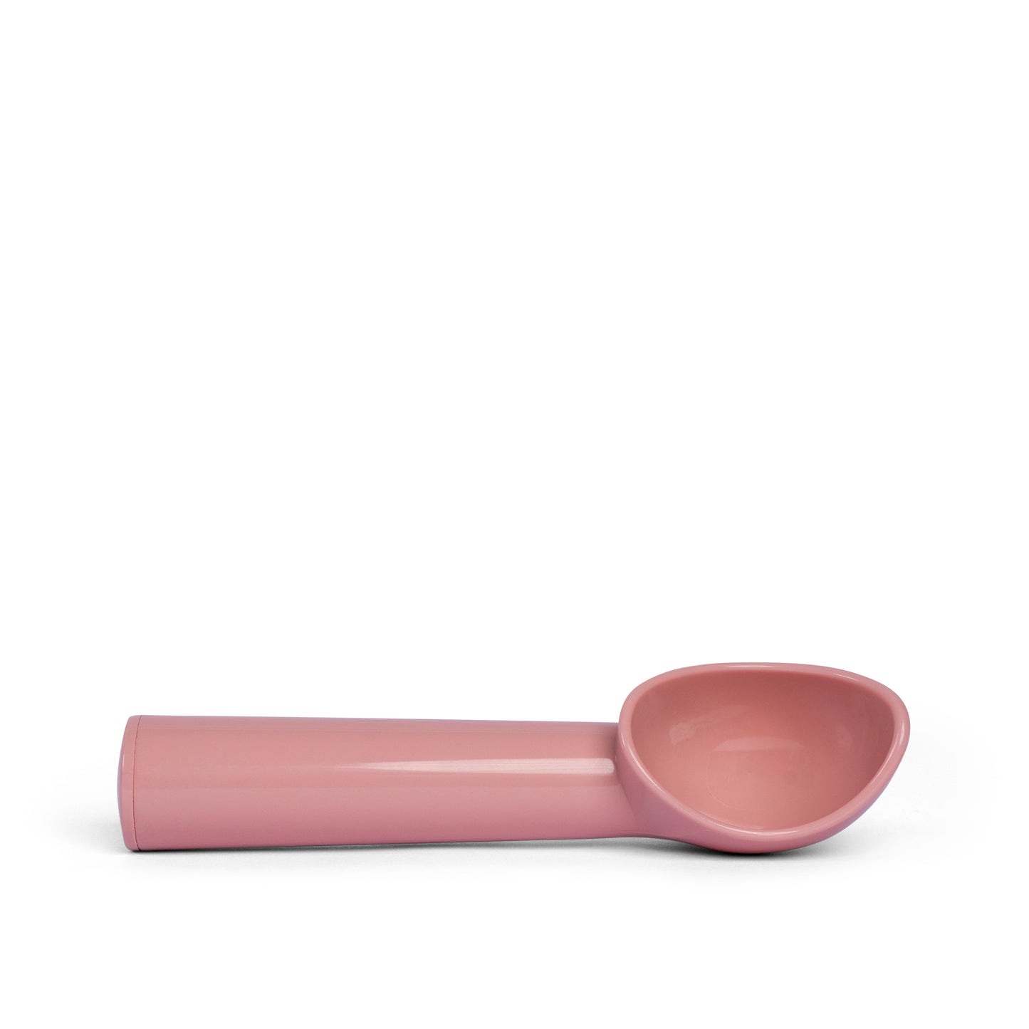 Pink ice cream scoop for serving ice cream gelato sorbet and frozen desserts with ergonomic handle side view