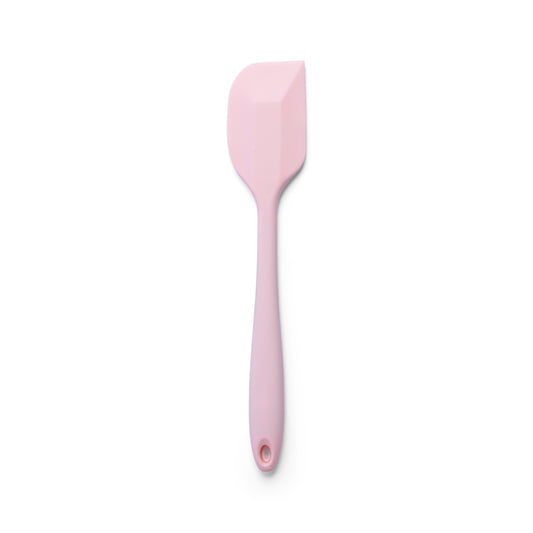 Pink silicone spatula for mixing cake batter folding ingredients scraping bowls and baking cakes cookies and desserts