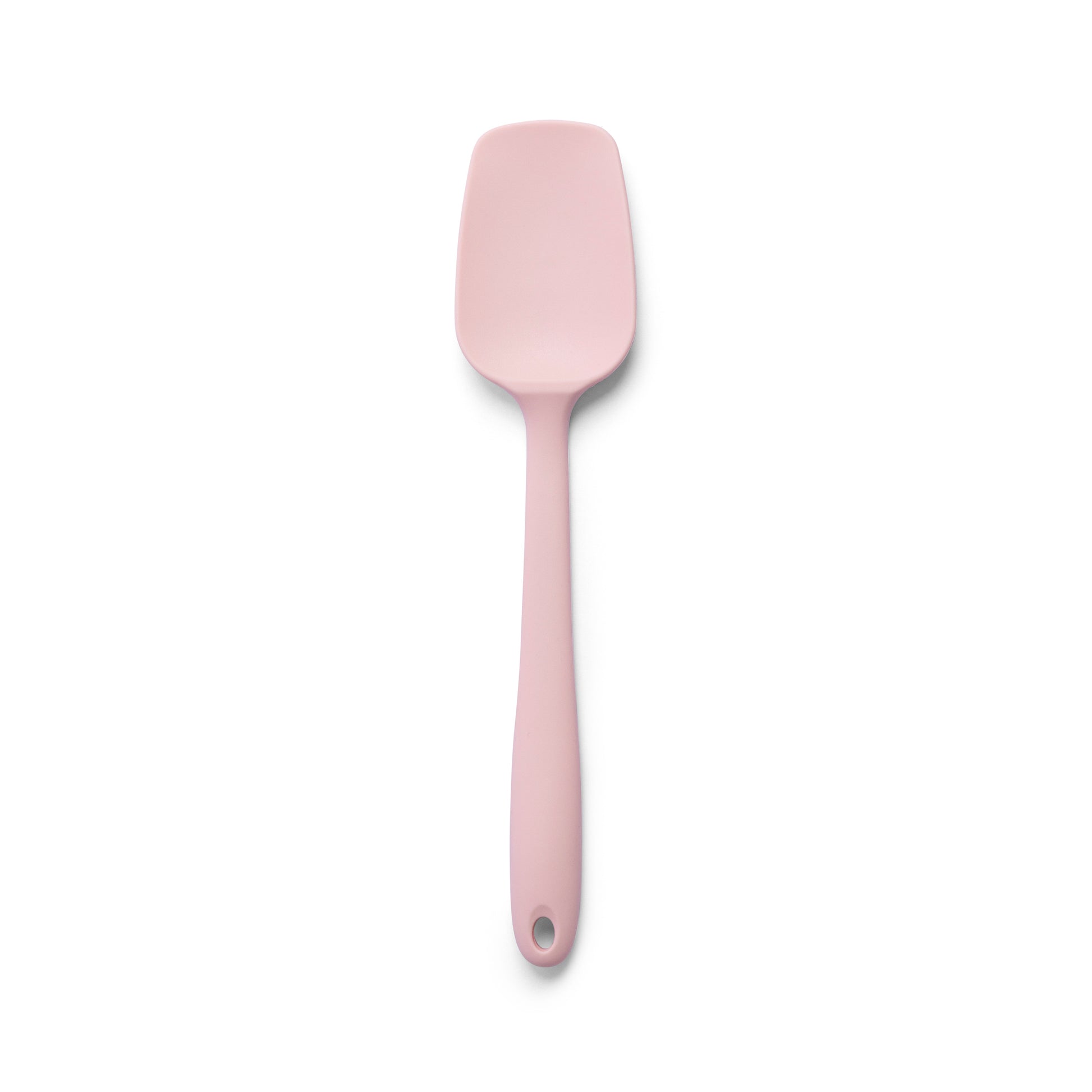 Pink silicone spatula for mixing cake batter scraping bowls folding ingredients spreading frosting and preparing homemade dessert recipes