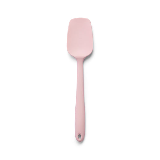 Pink silicone spatula for mixing cake batter scraping bowls folding ingredients spreading frosting and preparing homemade dessert recipes