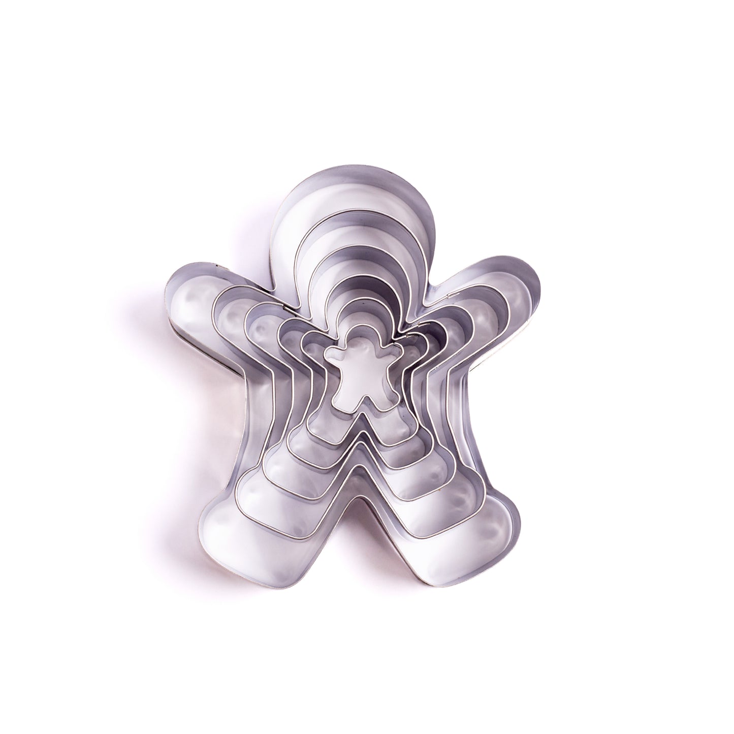 Nestled metal gingerbread person cookie cutter set in multiple sizes displayed on a white background
