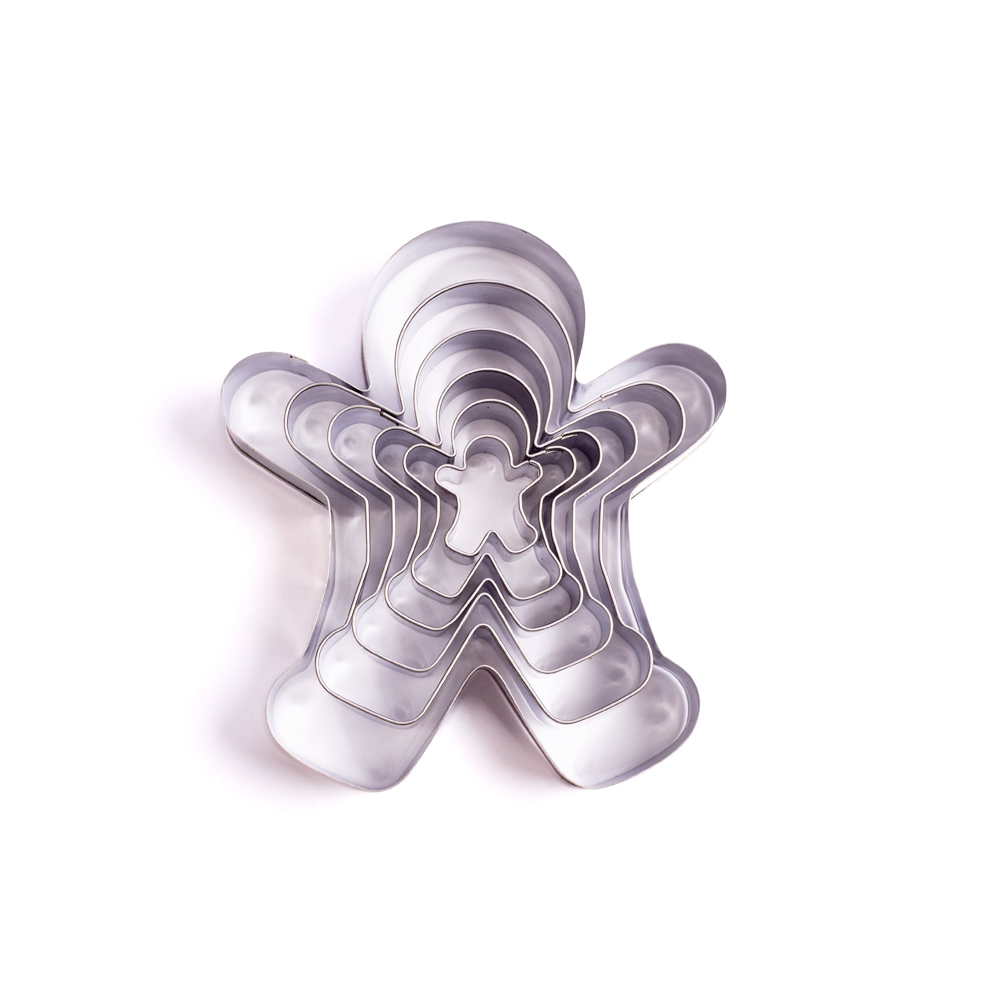 Nestled metal gingerbread person cookie cutter set in multiple sizes displayed on a white background
